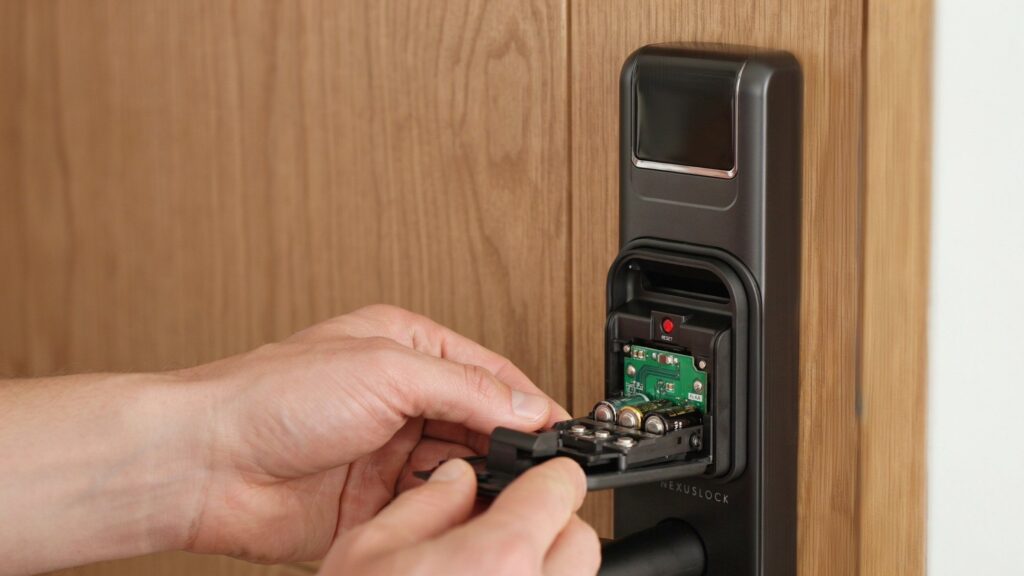 reset button inside battery cover
